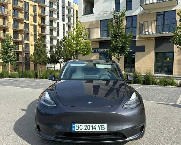 Серый Тесла Model Y, объемом двигателя 0 л и пробегом 74 тыс. км за 27800 $, фото 1 на Automoto.ua