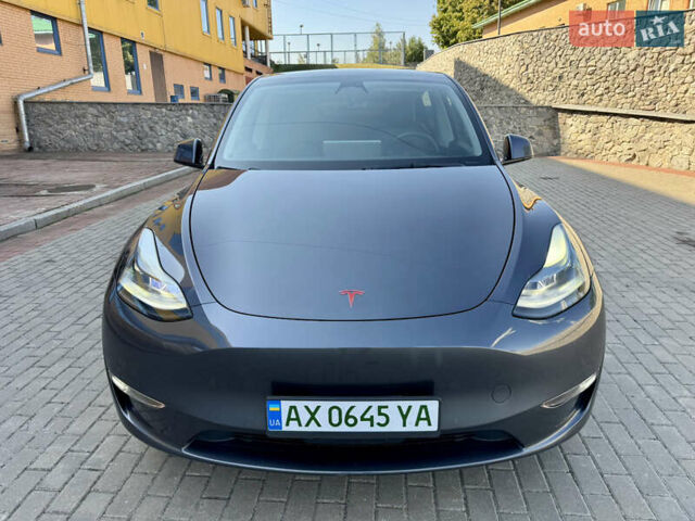 Серый Тесла Model Y, объемом двигателя 0 л и пробегом 107 тыс. км за 29800 $, фото 1 на Automoto.ua