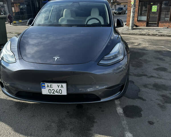 Серый Тесла Model Y, объемом двигателя 0 л и пробегом 20 тыс. км за 21500 $, фото 1 на Automoto.ua