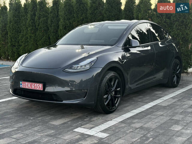 Серый Тесла Model Y, объемом двигателя 0 л и пробегом 85 тыс. км за 24800 $, фото 1 на Automoto.ua