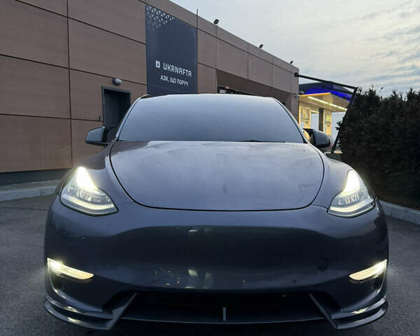 Серый Тесла Model Y, объемом двигателя 0 л и пробегом 49 тыс. км за 26500 $, фото 1 на Automoto.ua