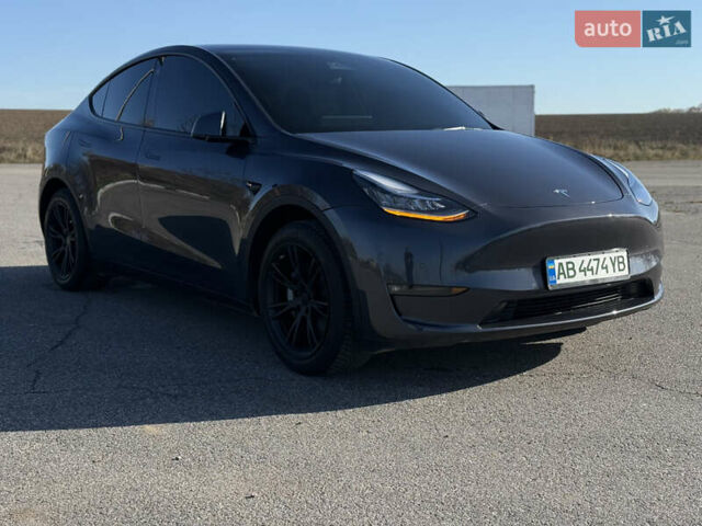 Серый Тесла Model Y, объемом двигателя 0 л и пробегом 44 тыс. км за 26000 $, фото 1 на Automoto.ua