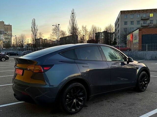 Серый Тесла Model Y, объемом двигателя 0 л и пробегом 52 тыс. км за 23500 $, фото 1 на Automoto.ua