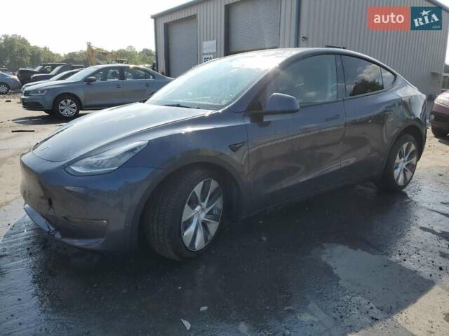 Серый Тесла Model Y, объемом двигателя 0 л и пробегом 81 тыс. км за 17500 $, фото 1 на Automoto.ua