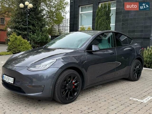 Серый Тесла Model Y, объемом двигателя 0 л и пробегом 65 тыс. км за 24400 $, фото 1 на Automoto.ua