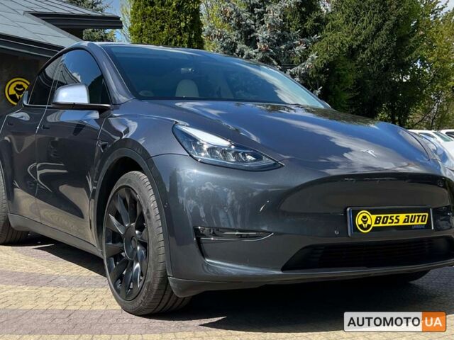 Серый Тесла Model Y, объемом двигателя 75 л и пробегом 43 тыс. км за 29700 $, фото 1 на Automoto.ua