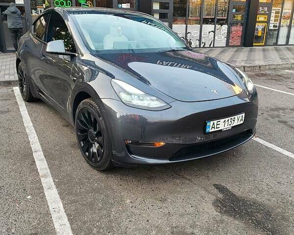 Серый Тесла Model Y, объемом двигателя 0 л и пробегом 53 тыс. км за 32761 $, фото 1 на Automoto.ua