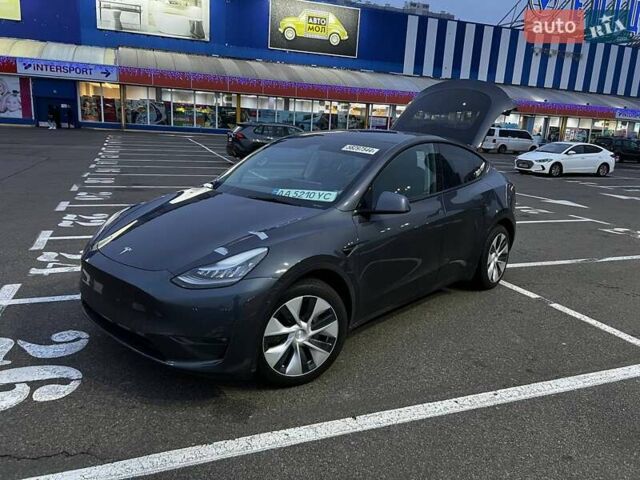 Серый Тесла Model Y, объемом двигателя 0 л и пробегом 80 тыс. км за 25000 $, фото 1 на Automoto.ua