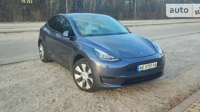 Серый Тесла Model Y, объемом двигателя 0 л и пробегом 61 тыс. км за 22900 $, фото 1 на Automoto.ua