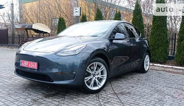 Сірий Тесла Model Y, об'ємом двигуна 0 л та пробігом 52 тис. км за 32200 $, фото 1 на Automoto.ua