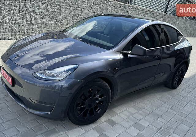 Серый Тесла Model Y, объемом двигателя 0 л и пробегом 80 тыс. км за 21500 $, фото 1 на Automoto.ua