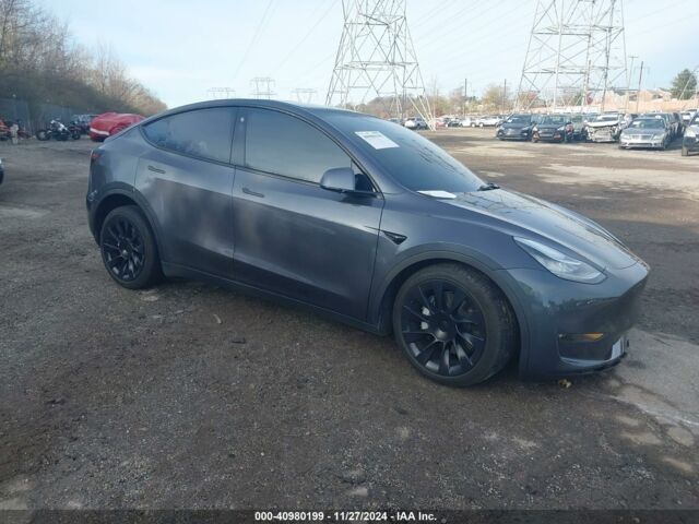 Серый Тесла Model Y, объемом двигателя 0 л и пробегом 0 тыс. км за 18300 $, фото 1 на Automoto.ua
