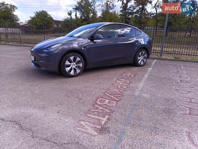 Серый Тесла Model Y, объемом двигателя 0 л и пробегом 80 тыс. км за 25000 $, фото 1 на Automoto.ua
