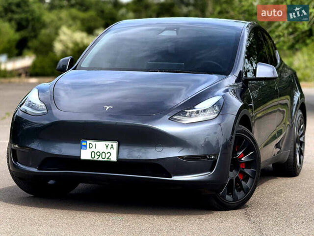 Серый Тесла Model Y, объемом двигателя 0 л и пробегом 91 тыс. км за 26500 $, фото 1 на Automoto.ua