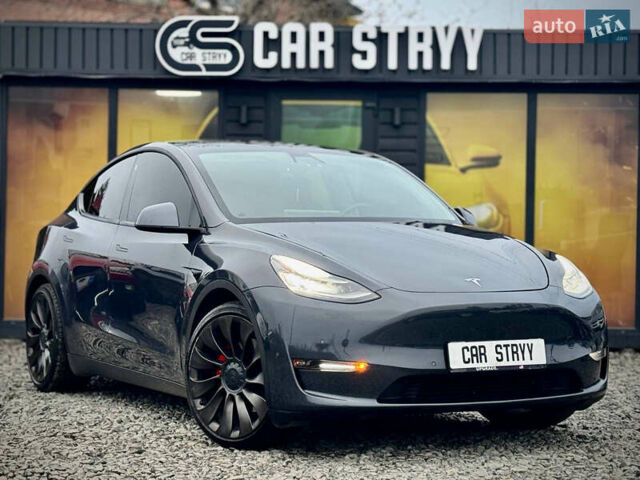 Серый Тесла Model Y, объемом двигателя 0 л и пробегом 107 тыс. км за 23999 $, фото 1 на Automoto.ua