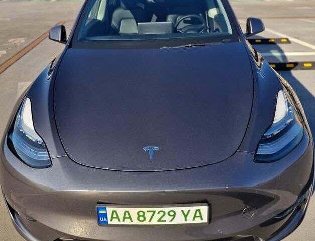 Серый Тесла Model Y, объемом двигателя 0 л и пробегом 76 тыс. км за 29700 $, фото 1 на Automoto.ua