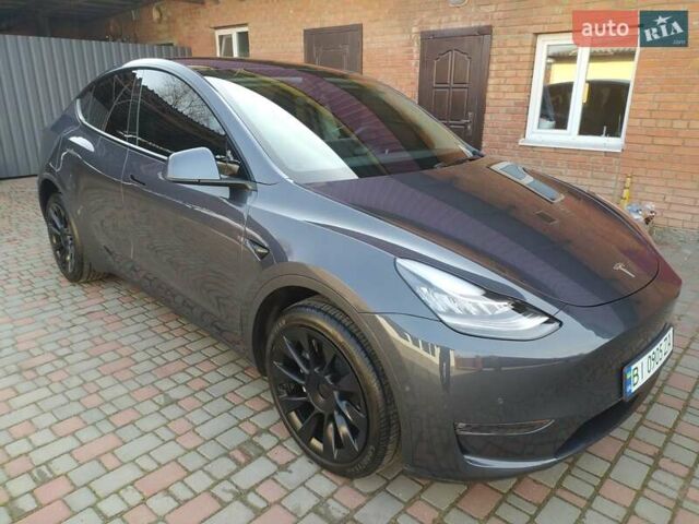Серый Тесла Model Y, объемом двигателя 0 л и пробегом 17 тыс. км за 34500 $, фото 1 на Automoto.ua