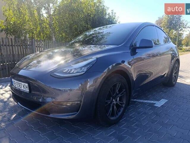 Серый Тесла Model Y, объемом двигателя 0 л и пробегом 29 тыс. км за 27500 $, фото 1 на Automoto.ua