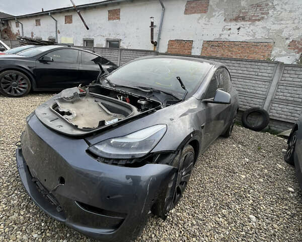 Серый Тесла Model Y, объемом двигателя 0 л и пробегом 99 тыс. км за 19600 $, фото 1 на Automoto.ua