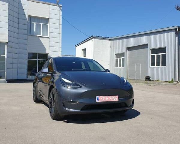 Серый Тесла Model Y, объемом двигателя 0 л и пробегом 22 тыс. км за 38500 $, фото 1 на Automoto.ua