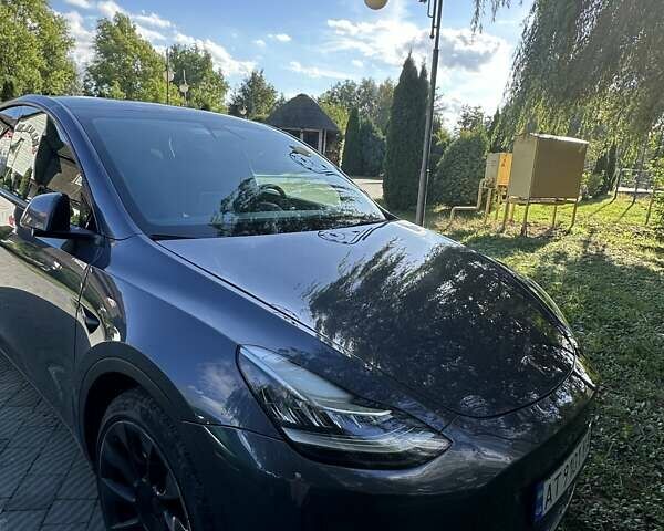 Серый Тесла Model Y, объемом двигателя 0 л и пробегом 60 тыс. км за 28999 $, фото 1 на Automoto.ua