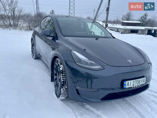 Серый Тесла Model Y, объемом двигателя 0 л и пробегом 54 тыс. км за 26900 $, фото 1 на Automoto.ua