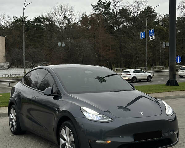 Серый Тесла Model Y, объемом двигателя 0 л и пробегом 41 тыс. км за 29300 $, фото 1 на Automoto.ua