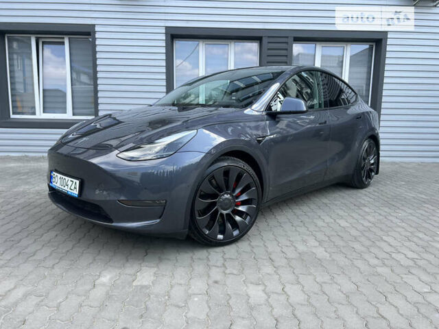 Серый Тесла Model Y, объемом двигателя 0 л и пробегом 2 тыс. км за 26999 $, фото 1 на Automoto.ua