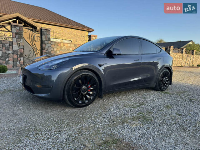 Серый Тесла Model Y, объемом двигателя 0 л и пробегом 112 тыс. км за 27700 $, фото 1 на Automoto.ua
