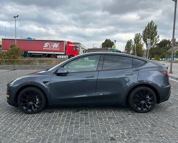 Серый Тесла Model Y, объемом двигателя 0 л и пробегом 65 тыс. км за 21000 $, фото 1 на Automoto.ua