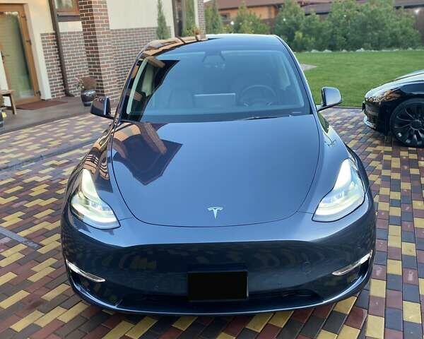 Серый Тесла Model Y, объемом двигателя 0 л и пробегом 26 тыс. км за 35200 $, фото 1 на Automoto.ua