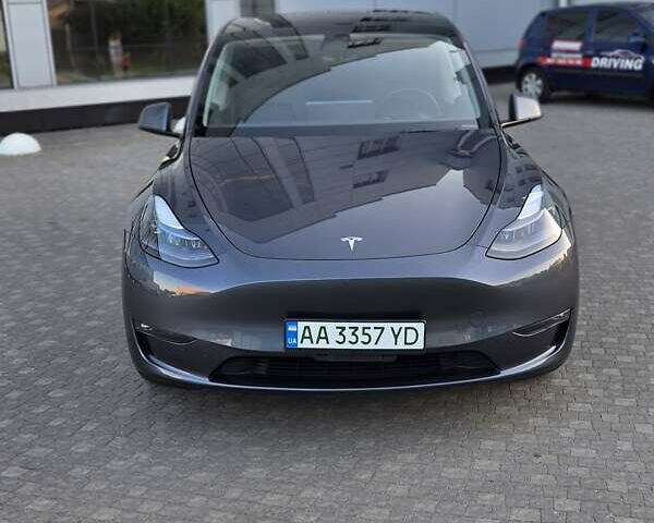 Серый Тесла Model Y, объемом двигателя 0 л и пробегом 77 тыс. км за 25499 $, фото 1 на Automoto.ua
