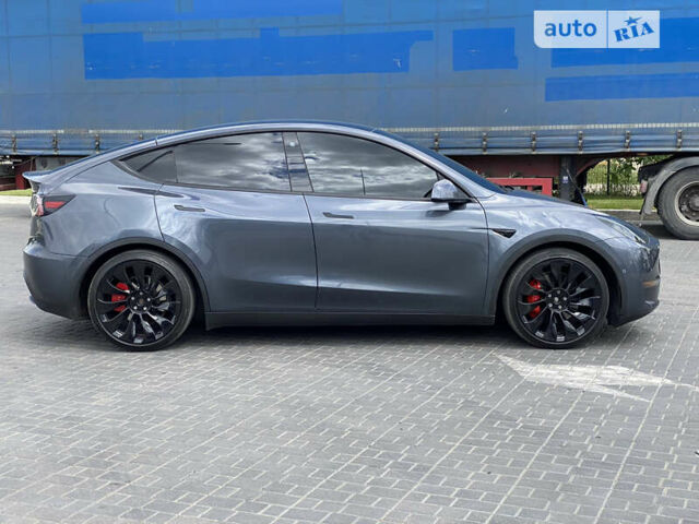 Серый Тесла Model Y, объемом двигателя 0 л и пробегом 112 тыс. км за 34900 $, фото 1 на Automoto.ua