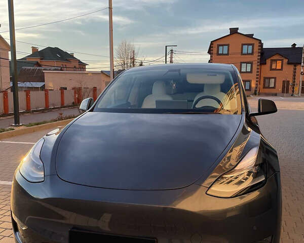 Серый Тесла Model Y, объемом двигателя 0 л и пробегом 41 тыс. км за 27500 $, фото 1 на Automoto.ua