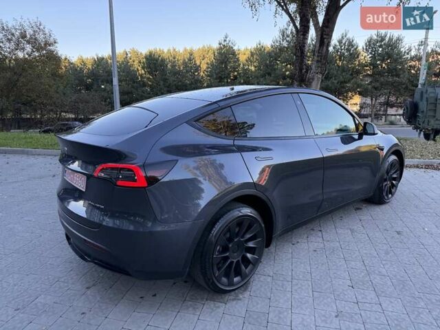 Серый Тесла Model Y, объемом двигателя 0 л и пробегом 38 тыс. км за 24999 $, фото 1 на Automoto.ua