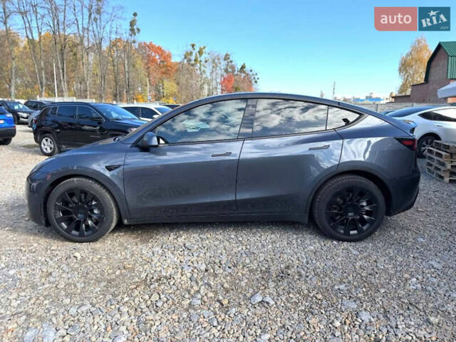 Серый Тесла Model Y, объемом двигателя 0 л и пробегом 85 тыс. км за 24500 $, фото 1 на Automoto.ua