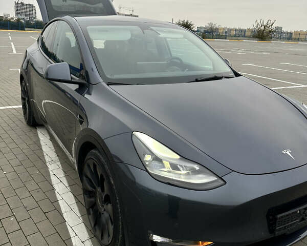 Серый Тесла Model Y, объемом двигателя 0 л и пробегом 58 тыс. км за 28500 $, фото 1 на Automoto.ua
