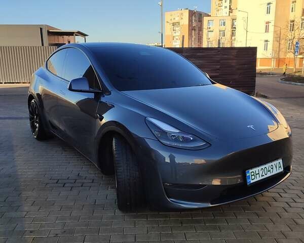 Серый Тесла Model Y, объемом двигателя 0 л и пробегом 31 тыс. км за 29000 $, фото 1 на Automoto.ua