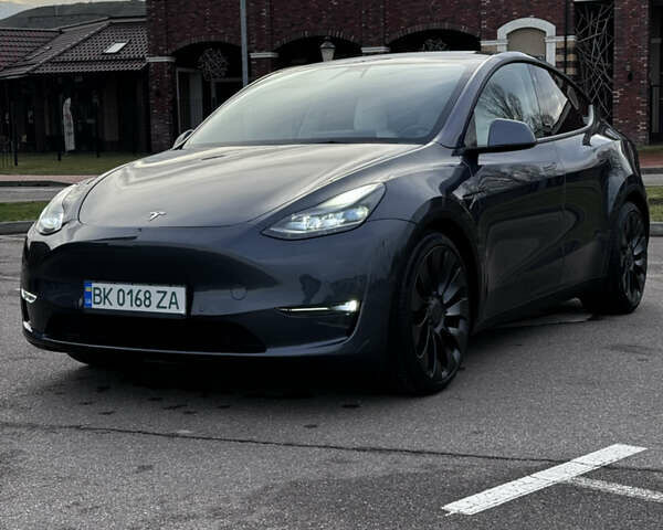 Серый Тесла Model Y, объемом двигателя 0 л и пробегом 26 тыс. км за 28900 $, фото 1 на Automoto.ua