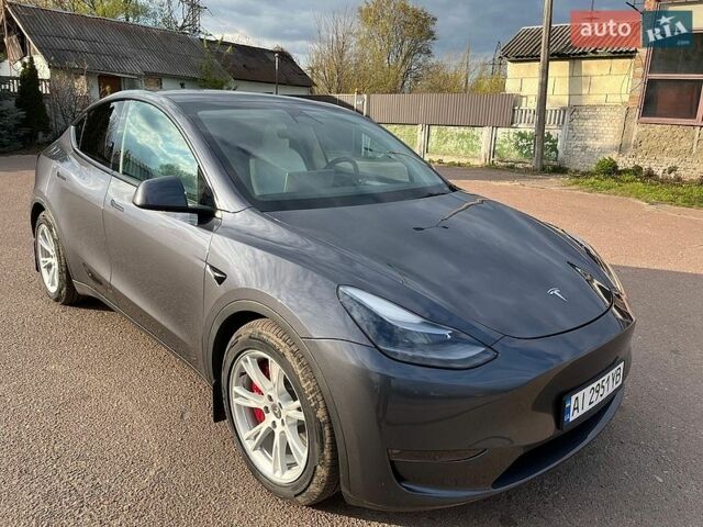 Серый Тесла Model Y, объемом двигателя 0 л и пробегом 74 тыс. км за 28500 $, фото 1 на Automoto.ua