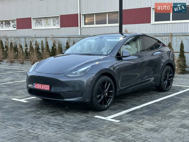 Серый Тесла Model Y, объемом двигателя 0 л и пробегом 10 тыс. км за 24800 $, фото 1 на Automoto.ua