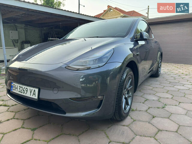 Серый Тесла Model Y, объемом двигателя 0 л и пробегом 24 тыс. км за 26400 $, фото 1 на Automoto.ua