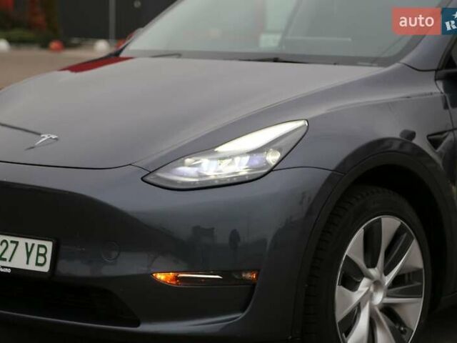 Серый Тесла Model Y, объемом двигателя 0 л и пробегом 50 тыс. км за 33900 $, фото 1 на Automoto.ua