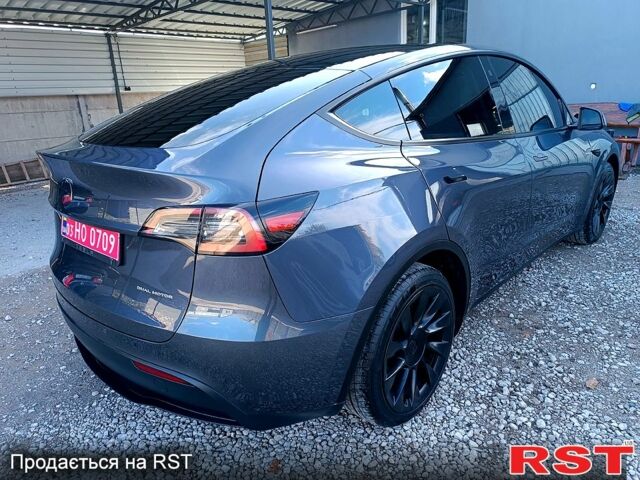 Серый Тесла Model Y, объемом двигателя 0.33 л и пробегом 43 тыс. км за 33333 $, фото 1 на Automoto.ua