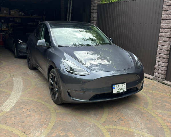 Серый Тесла Model Y, объемом двигателя 0 л и пробегом 32 тыс. км за 33500 $, фото 1 на Automoto.ua