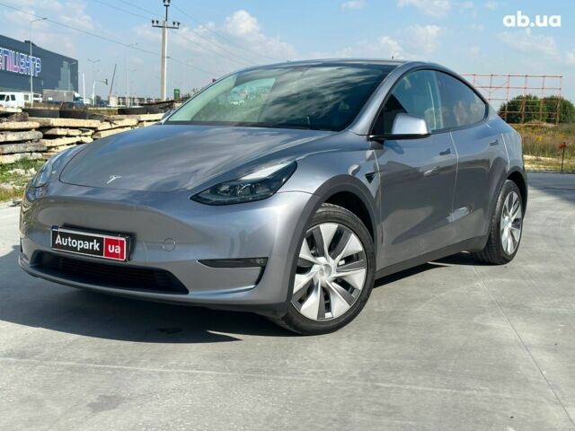 Серый Тесла Model Y, объемом двигателя 0 л и пробегом 23 тыс. км за 49990 $, фото 1 на Automoto.ua
