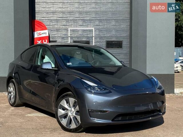 Серый Тесла Model Y, объемом двигателя 0 л и пробегом 32 тыс. км за 31999 $, фото 1 на Automoto.ua