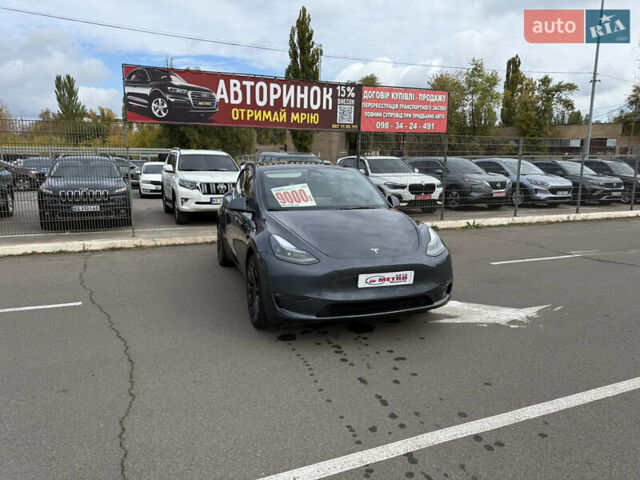 Серый Тесла Model Y, объемом двигателя 0 л и пробегом 71 тыс. км за 28900 $, фото 1 на Automoto.ua