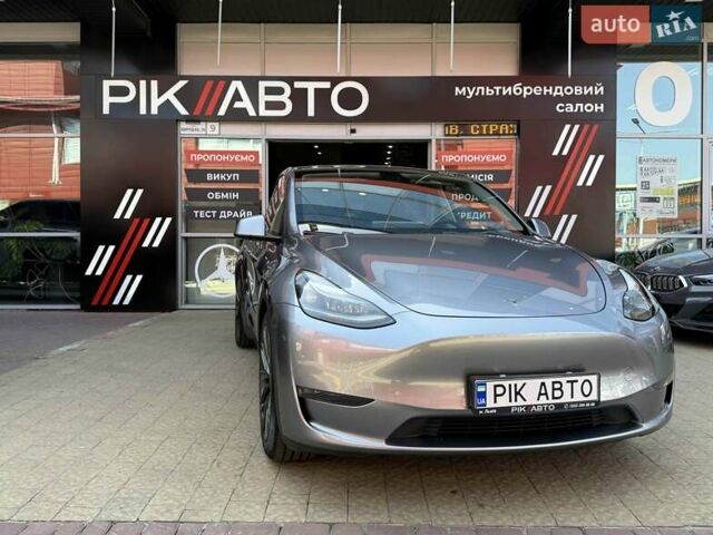Серый Тесла Model Y, объемом двигателя 0 л и пробегом 20 тыс. км за 42900 $, фото 1 на Automoto.ua