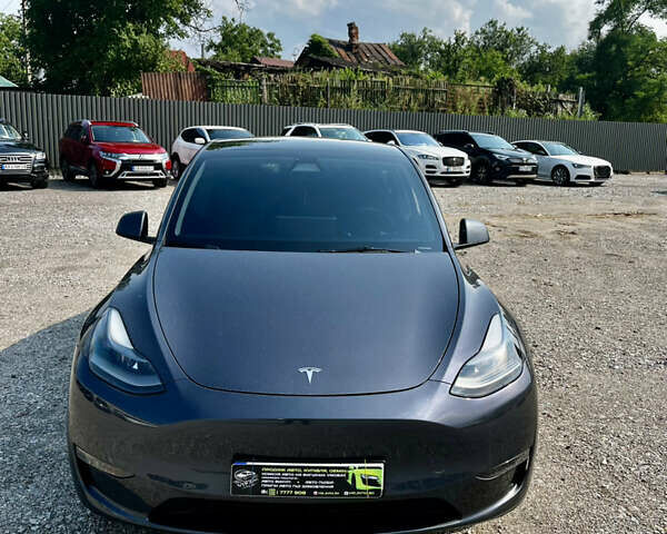 Серый Тесла Model Y, объемом двигателя 0 л и пробегом 11 тыс. км за 36999 $, фото 1 на Automoto.ua